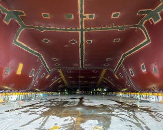 Illustration for article titled Pictures of the World's Biggest Cargo Ship Make You Feel Tiny